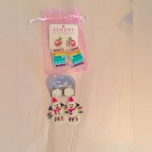 Adorable fun earrings!! Santa earrings and read more books earrings